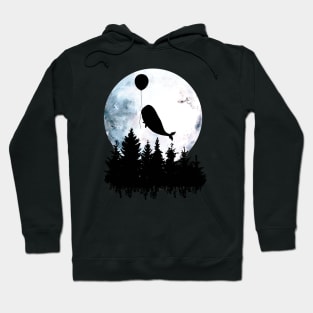 Whale flies with a balloon over forest, black silhouette on the full moon Hoodie